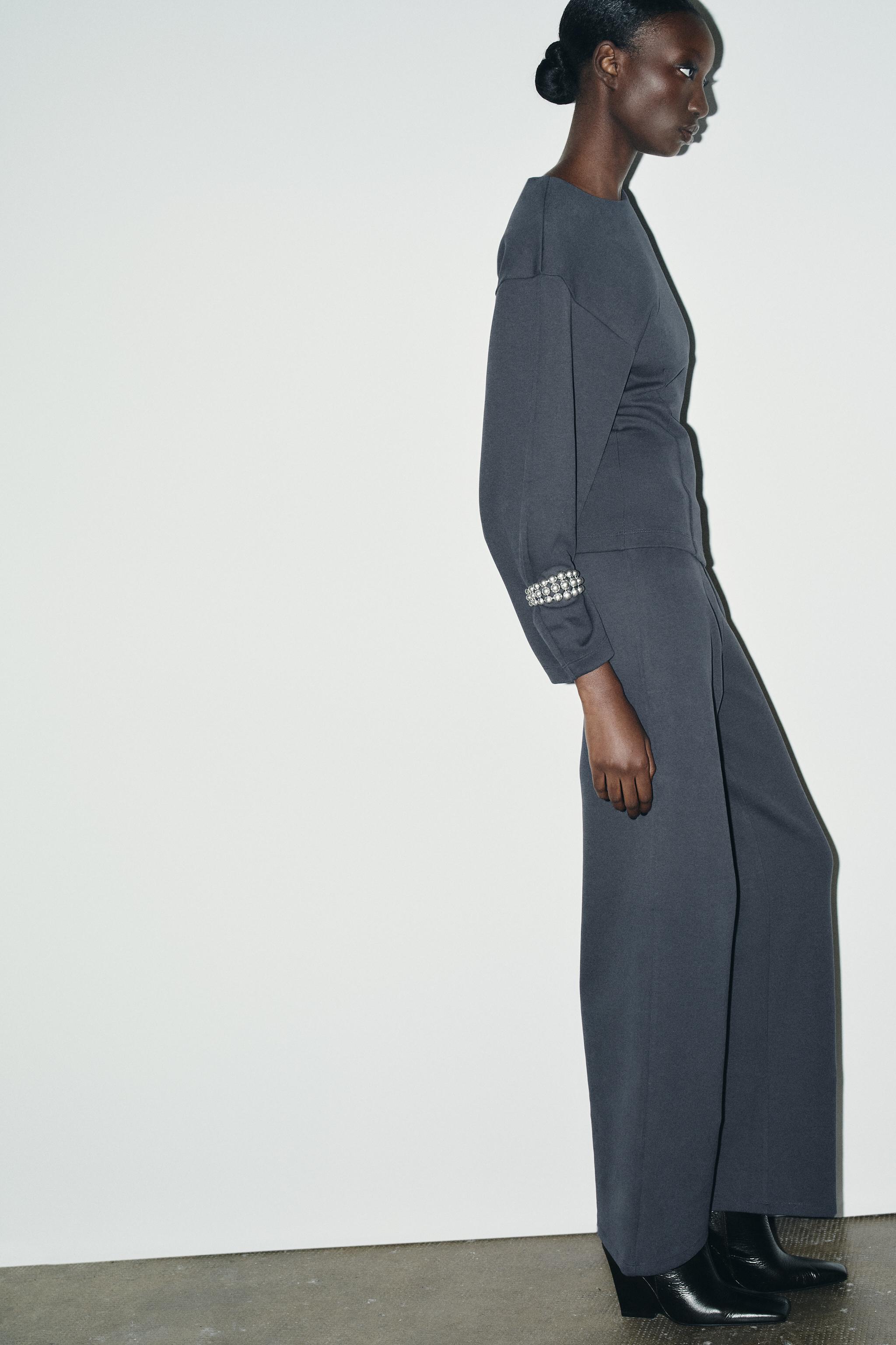 INTERLOCK JUMPER WITH DARTS